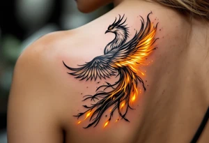 magnificent phoenix rising from golden flames with trailing embers tattoo idea