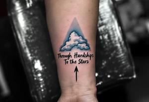 Scrawled in ink that fades from cobalt to silver, the quote “Through Hardships To the Stars” runs under an arrow piercing the clouds skyward. tattoo idea