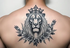 powerful majestic lion with a crown, surrounded by floral ornaments and birds tattoo idea