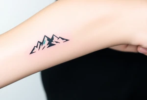 A pair of minimalist black and blue mountain peaks, one tattooed on the one´s forearm and the matching smaller version on the cother tattoo idea