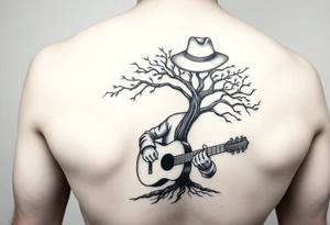 Man with hat but cant see face 
playing acoustic guitar underneath tree of life concept style tattoo idea