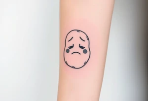 Cartoon potato with sad face tattoo idea