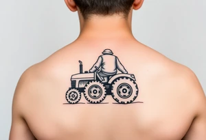 minimalist back view of curly headed toddler son riding a toy tractor with a geometric frame tattoo idea