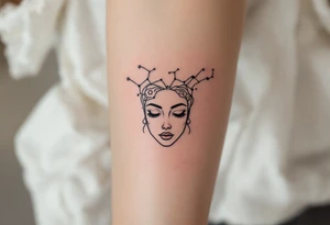 A minimal Virgo constellation in jet black connects above a fine-line portrait of the Virgo zodiac symbol in bronze. tattoo idea