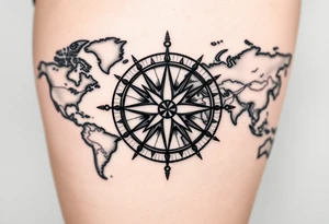 antique compass rose overlaid on weathered world map with sailing ships tattoo idea