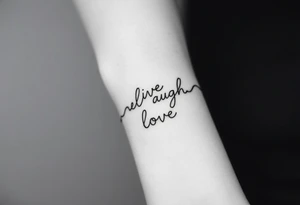 Live laugh love tattoo thats a bracelet that wraps around very dainty tattoo idea