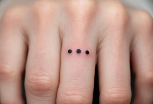 Three fine-line black dots in a row on the finger – Representing body, mind, and spirit in perfect alignment. tattoo idea