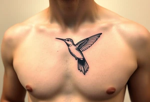 small, manly, and minimalist hummingbird on upper left side of the chest tattoo idea