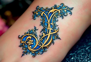 Ornate gold "J" with baroque-style filigree details and royal blue shading. tattoo idea