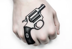 Actual size Revolver .45 caliber elegant but simple art work on gun. With fingers being the barrel and, butt of gun towards wrist. tattoo idea