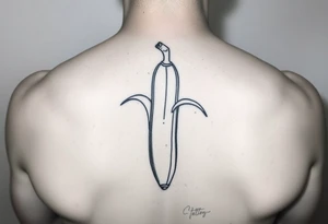 Erect penis disguised as a banana tattoo idea
