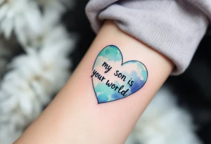 A watercolor heart filled with sky blue and mint green, with the words “My Son Is My World” in black ink. tattoo idea