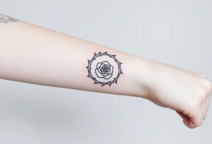 Crown of thorns with a rose in the middle tattoo idea