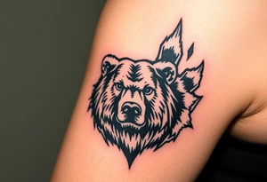Bears paw with bear face in the middle tattoo idea