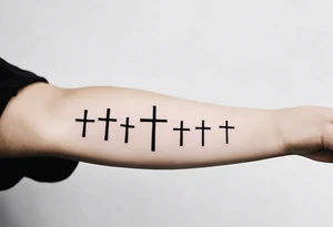 bible verse tattoo on forearm with 3 crosses under tattoo idea