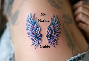 A pair of angel wings in light blue and lavender with “My Mother, My Guide” between them. tattoo idea
