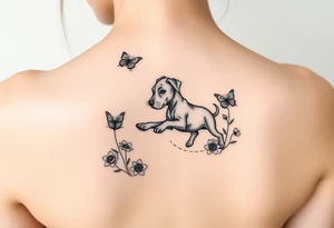 Small tattoo of Great Dane puppy playing in flowers and chasing a butterfly. tattoo idea