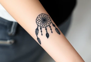 native dreamcatcher with flowing feathers and sacred beads tattoo idea