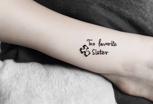 small, delicate tattoo in memory of my sister. Include the handwritten message:  "to my favorite sister" with a single puzzle piece on my ankle. The words should outline the puzzle piece tattoo idea