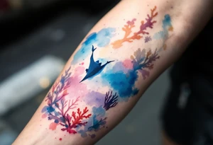 Ray swimming, diver bellow, coral reef bellow for forearm tattoo idea