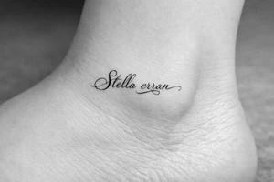 Stella erran, and then beautiful calligraphy cursive on the inner ankle and then beautiful calligraphy cursive on the inner ankle tattoo idea