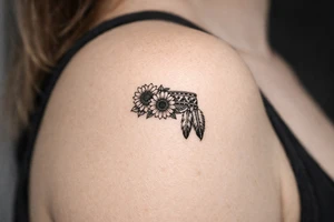 sunflowers with feathers and female Indian headband ribbon tattoo idea