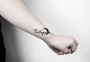 Forearm tattoo for a man using the name “Tatayana” Starting from the wrist, stretching to the elbow with the sun and moon tattoo idea