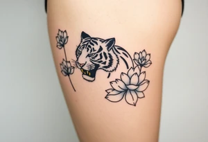 fierce tiger emerging through blooming lotus flowers in mist tattoo idea