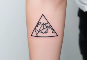 Small geometric triangle with a geometric paper plane going around the world with thin fine lines tattoo idea