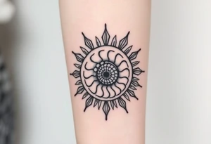 Fibonacci spiral shell inside of sun tattoo idea