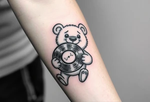 happy cartoon bear holding a vinyl record tattoo idea