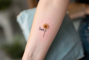 Word "Sun" written vertical with small sunflower in pink tattoo idea