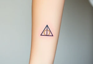 A delicate Deathly Hallows full symbol in thin gold lines in shades of deep purple and midnight blue tattoo idea
