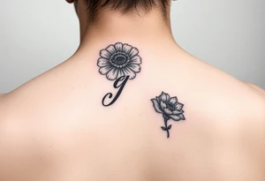 Initial g in cursive added into the October birth flower (marigold) small dainty behind the ear tattoo idea