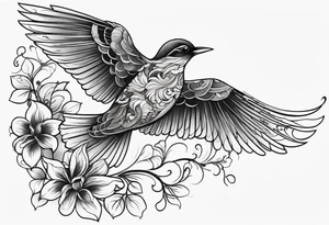 Flying bird on shoulder blade, medium size, with flowing leaves and vines tattoo idea