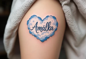 A heart shaped from soft clouds in baby blue, holding the name Amálka in gentle script. tattoo idea