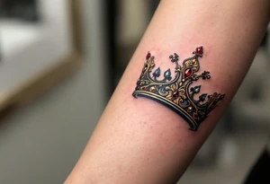 Baroque-style crowns designs with gold and ruby detailing. tattoo idea