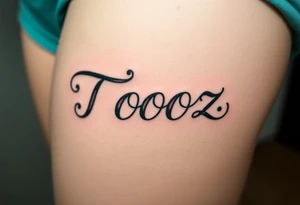 Tooz in cursive surrounded by large geers tattoo idea