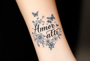 “Amor Fati” with small colorful flowers and birds and butterflies tattoo idea