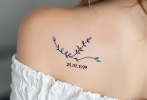 Cursive date 25. 02. 1999 flowing along the spine in cool gray with a hint of icy blue. tattoo idea