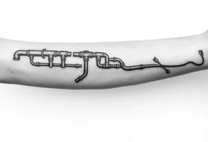 long System of pipes that transitions and transforms into veins of forearm. Top pipe starts closer to the elbow tattoo idea