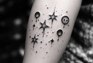 Small stars and tears background tattoo idea