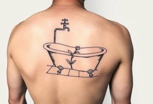 clawfoot bathtub with simple faucet and lily coming up out of the tile floor tattoo idea
