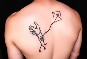 Hand holding  kite rip mum tattoo idea