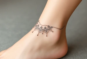 A soft grey lace anklet with tiny chains, blending elegance and femininity tattoo idea