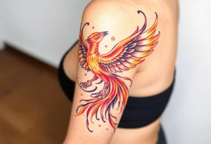 magnificent but feminine phoenix rising  flames with trailing embers tattoo idea