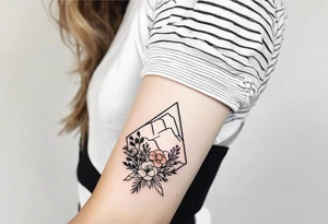 very small minimalist tattoo for female arm mountain and flowers tattoo idea