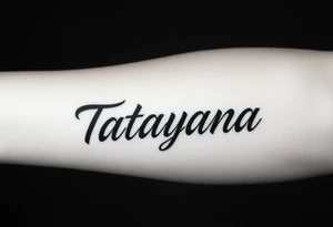 Tattoo for a man that says the name “Tatayana” tattoo idea