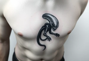 Alien on stomach tattoo idea