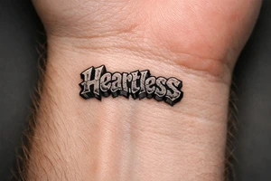 show me a tattoo of heartless with bubble letters tattoo idea